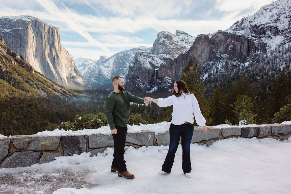 couple posing in winter and yosemite national park