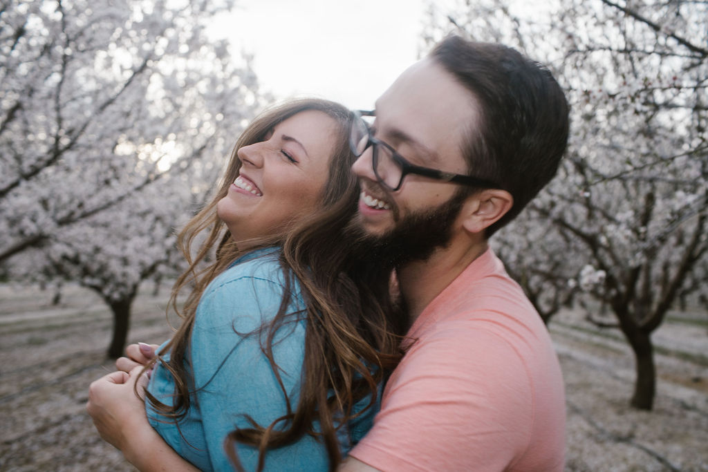 Couple being playful during california engagement session
