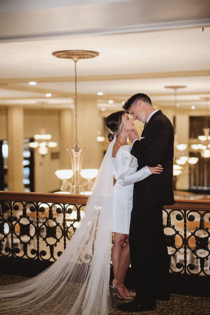 Bride and groom at The Grand 1401  by wedding photographer in Fresno, CA - Alyssa Michele Photo