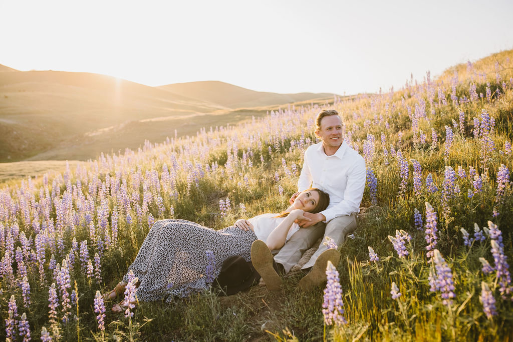 Couple posing for engagement photos in California
