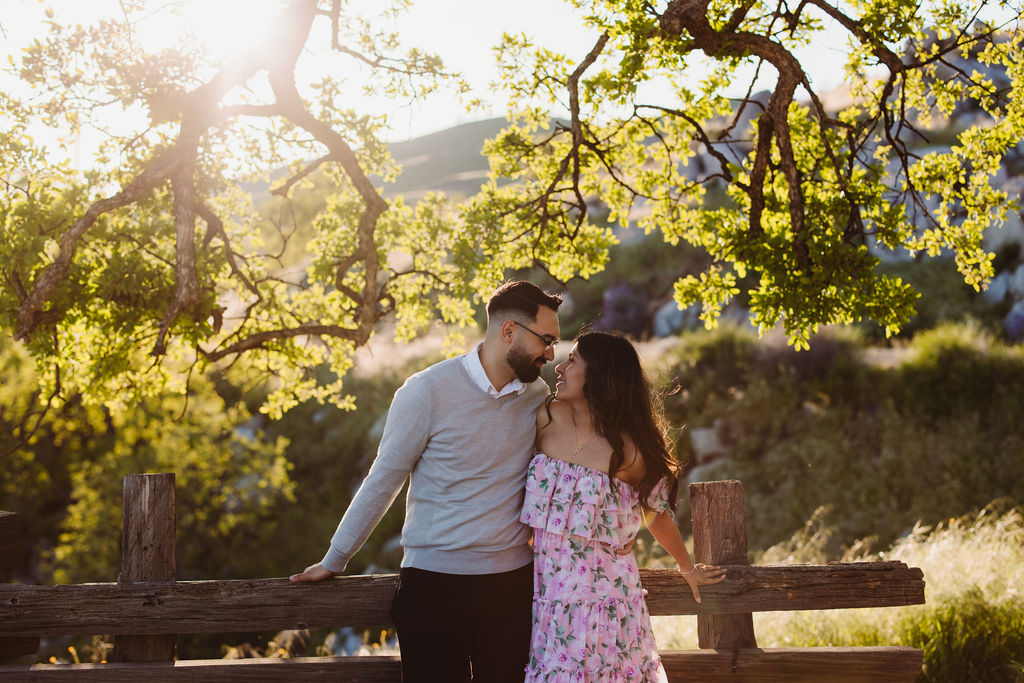 Couple posing engagement photos in Fresno California