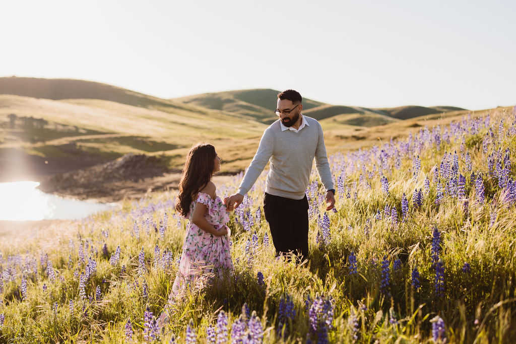 Couples wildflower engagement photos at Millerton Lake in the Central Valley of California