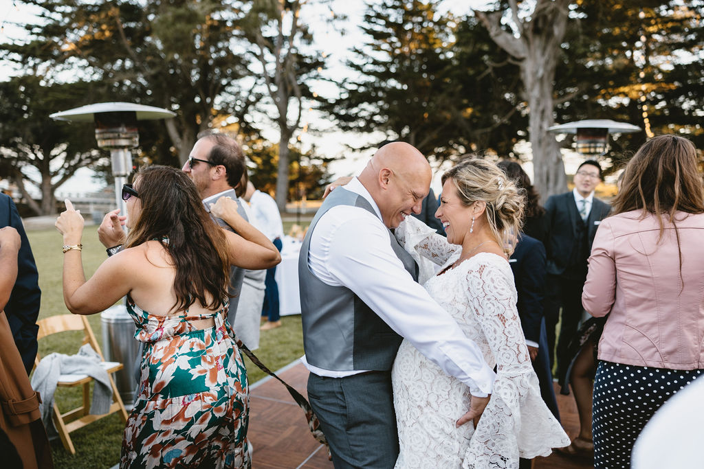 bride and groom dancing during reception - elopement vs wedding