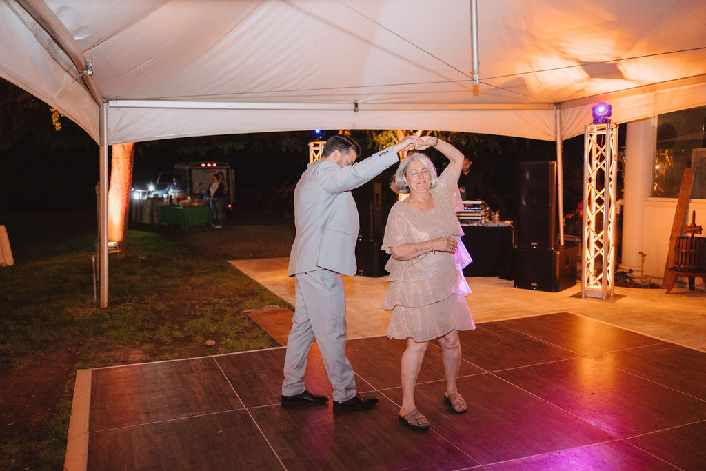 Son and mother dance at wedding
