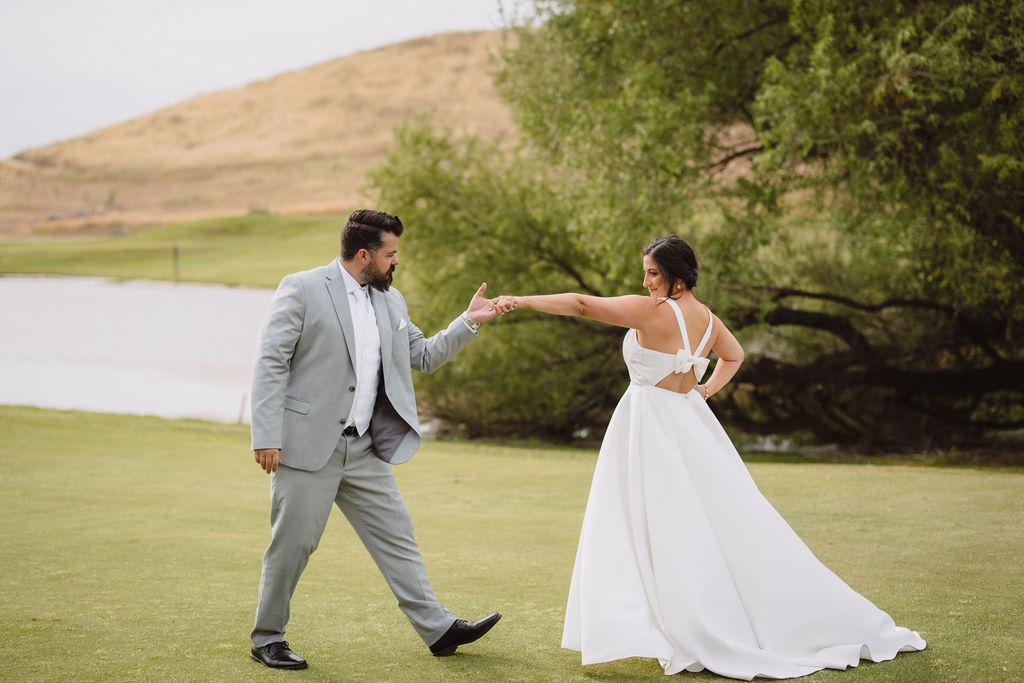 Bride and groom portraits at Eagle Springs Golf Course by Table Mountain Casino