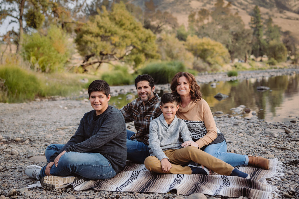 Family posing for photos during their Fresno fall mini session.