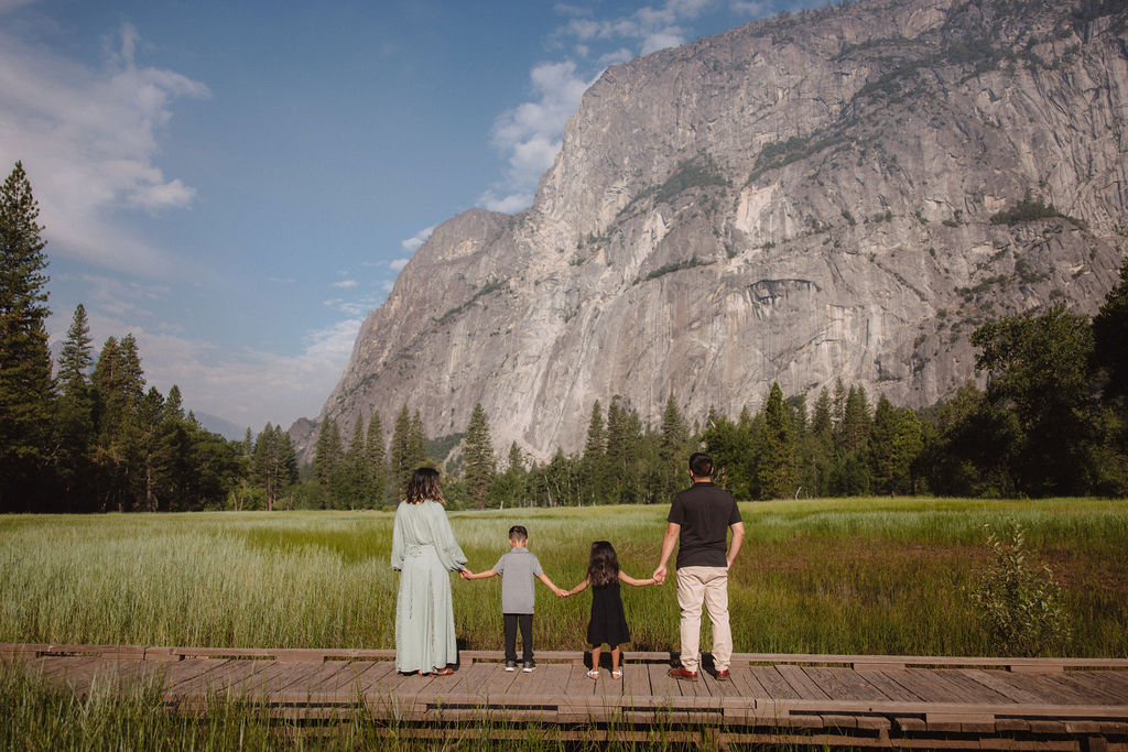 Family posing for photos in Yosemite captured by Alyssa Michele Photo - Yosemite Photographer