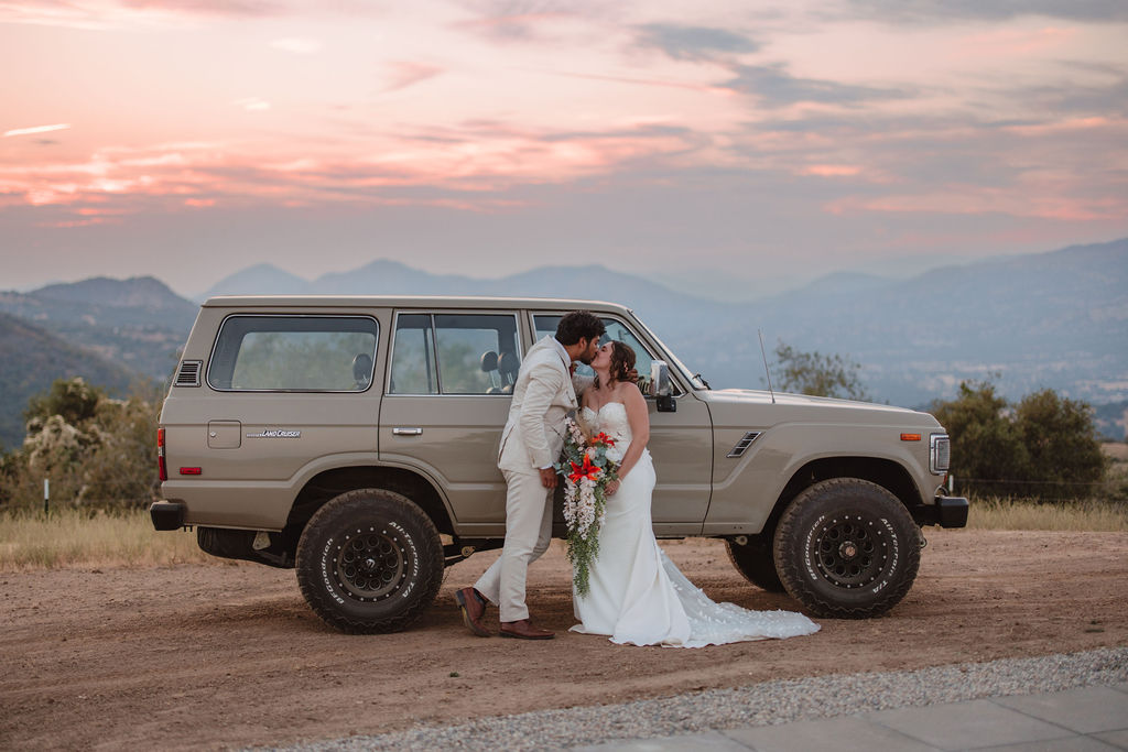 Bride and grooms sunset portraits with Jeep from California elopement