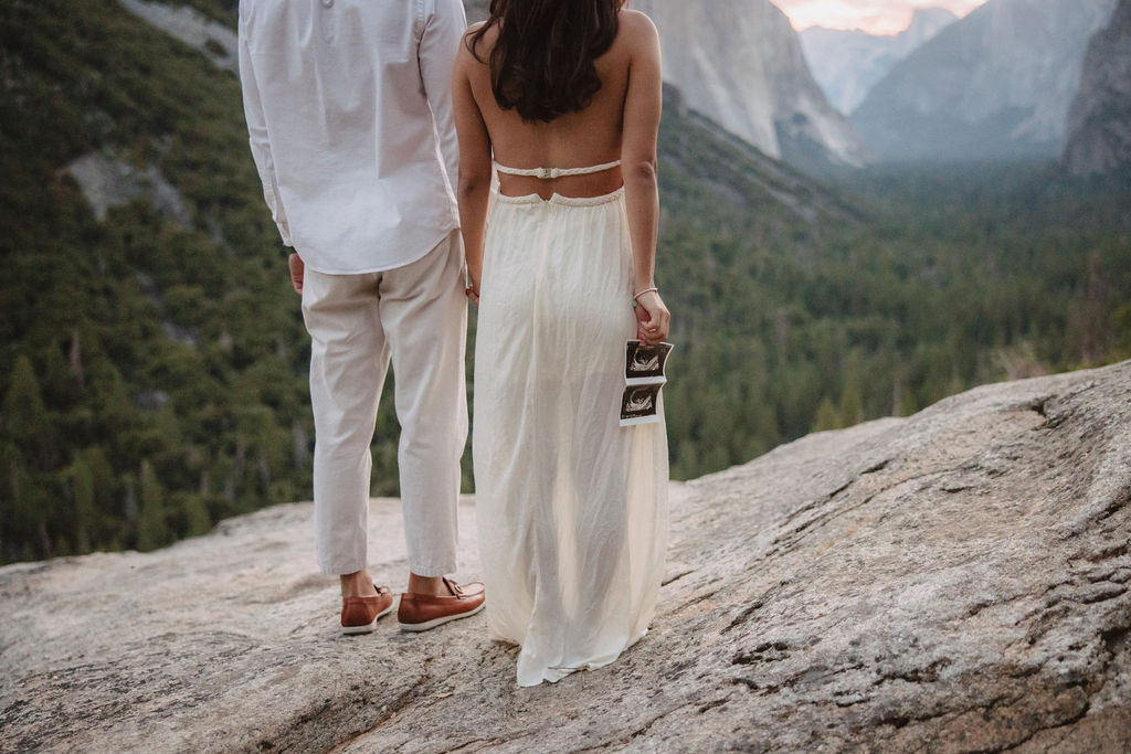 Couple posing for photos in the mountains