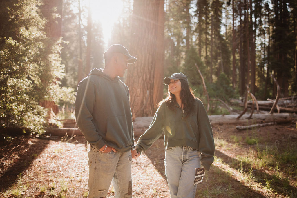 Pregnancy announcement photos at sunrise in Yosemite National Park