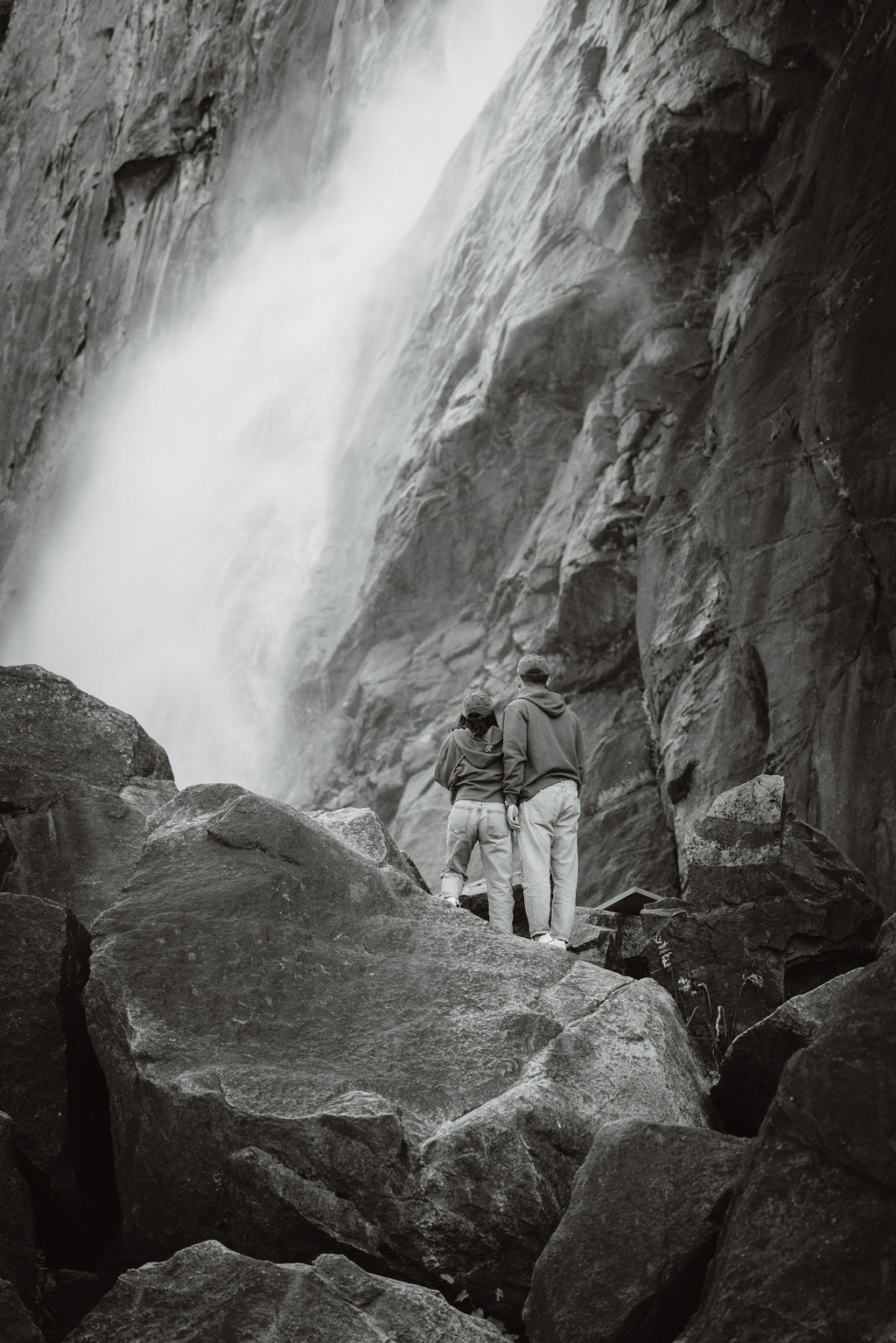 Couple watchin waterfall in Yosemite