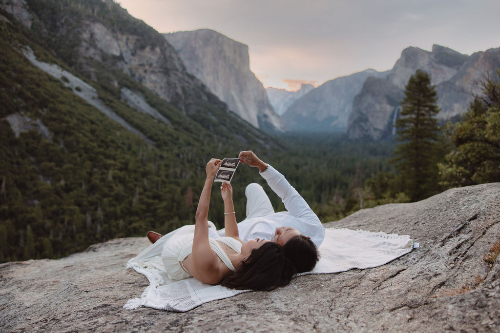 Pregnancy announcement photos at sunrise in Yosemite National Park