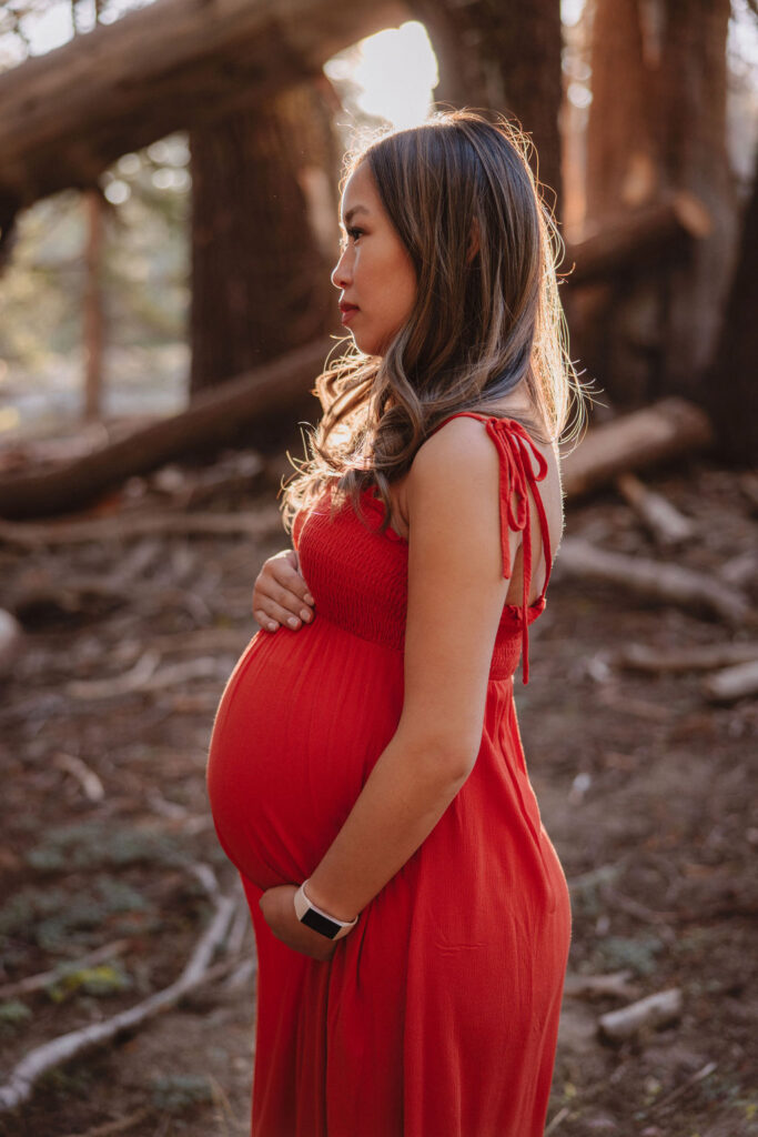 Woman posing for maternity shoot