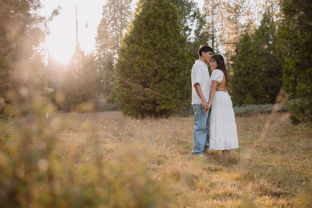 Couple posing for pictures near Fresno California