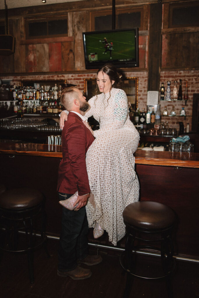 Bride and groom bar portraits from a A Fall Vintage Boho Wedding in California