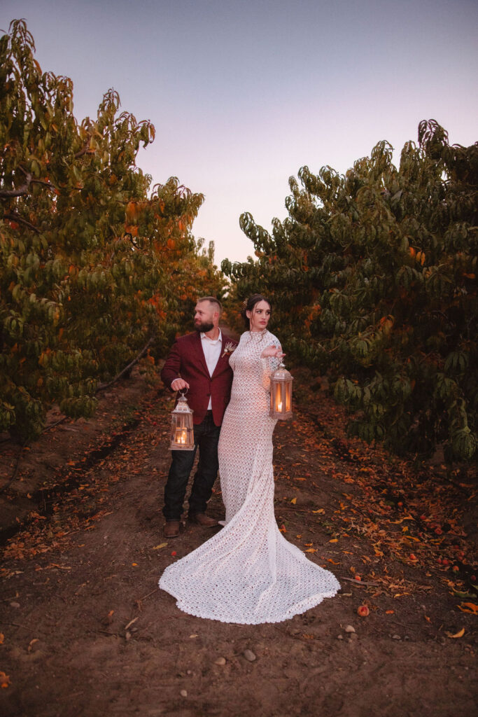 Bride and groom lantern portraits from a A Fall Vintage Boho Wedding in California