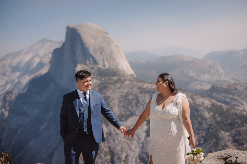 Bride and groom portraits at glacier point at noon
