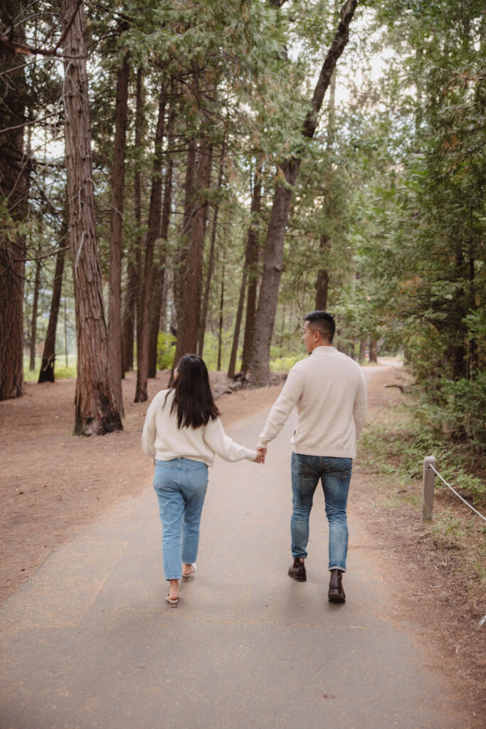 Couple walking a path in Yosemite National Park