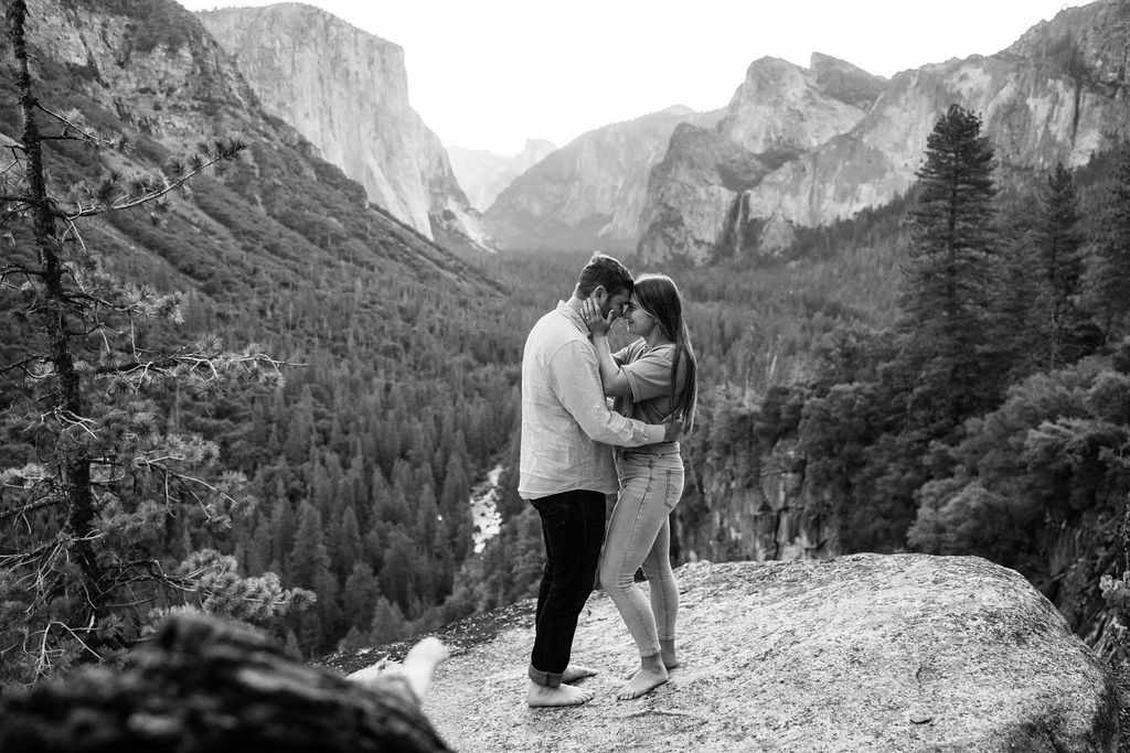 Couple posing for photos in YNP