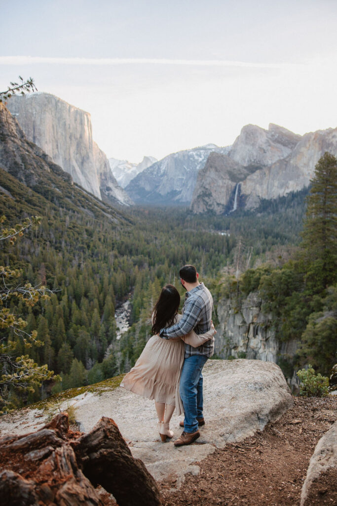 Man and woman hugging at Tunnel View