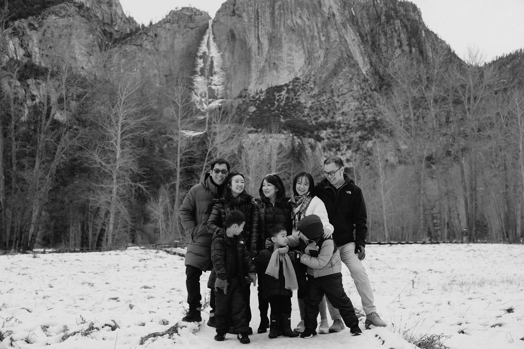 Family posing in the snow at yosemite