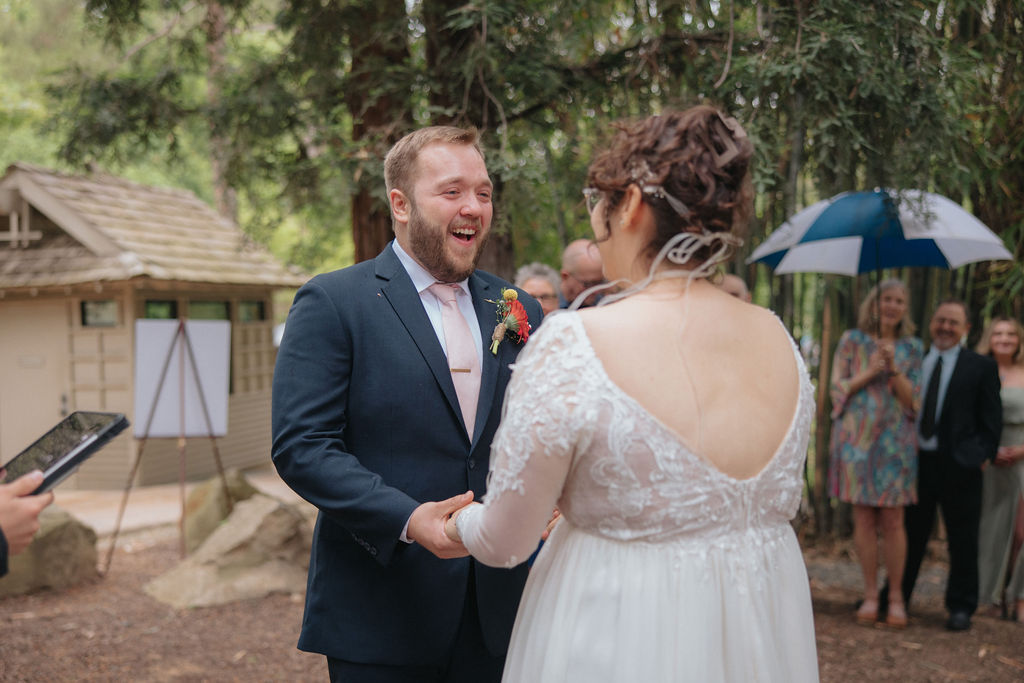 bride and groom posing for their wedding portraits at the Shinzen Friendship Garden
