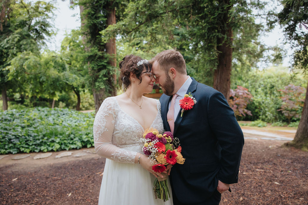 a rainy day elopement in a garden
