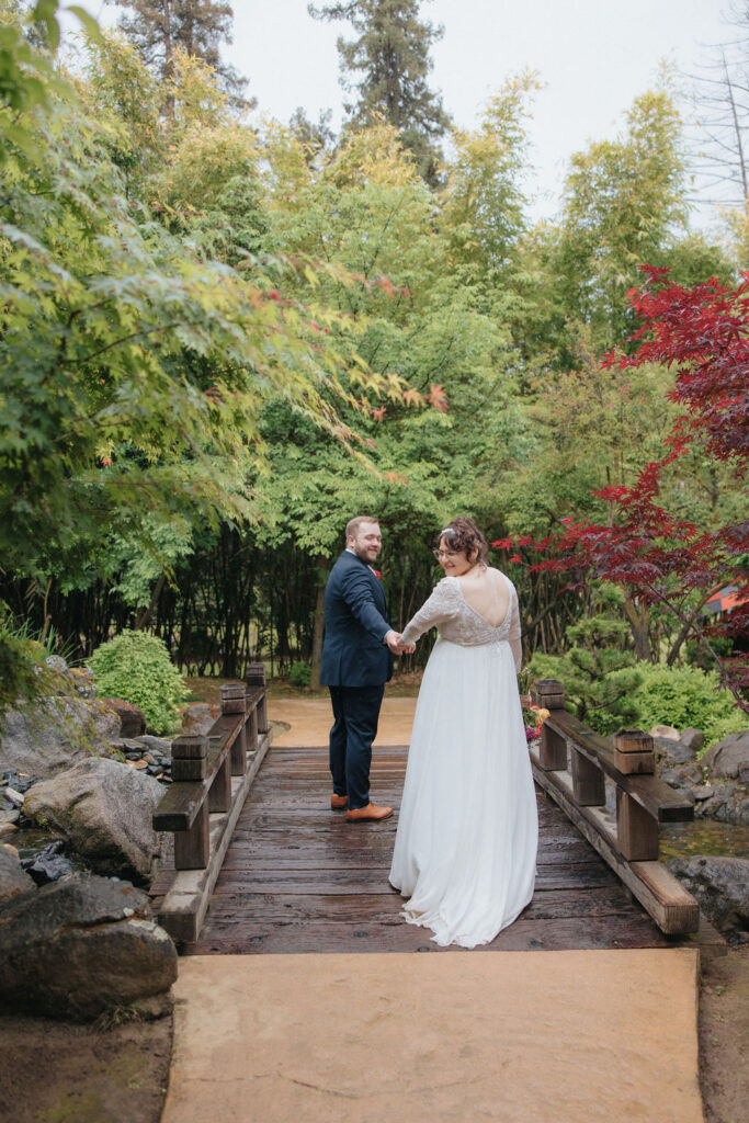 a rainy day elopement in a garden at the Shinzen Friendship Garden
