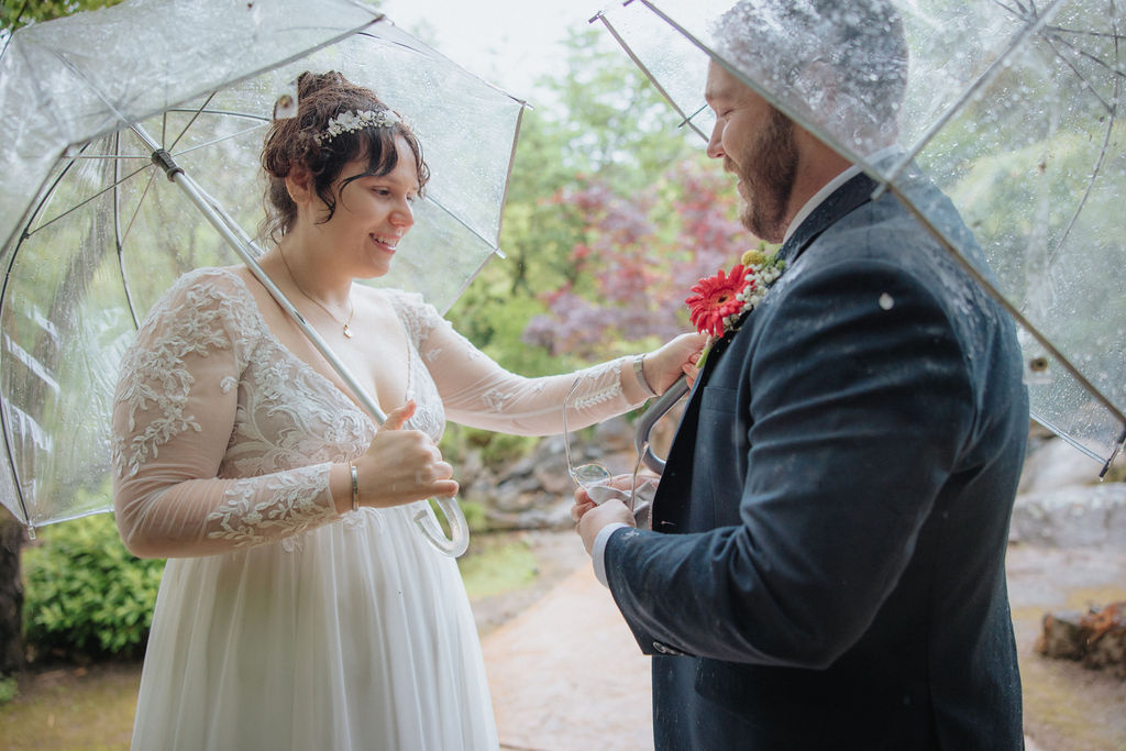 bride and groom posing for their wedding portraits