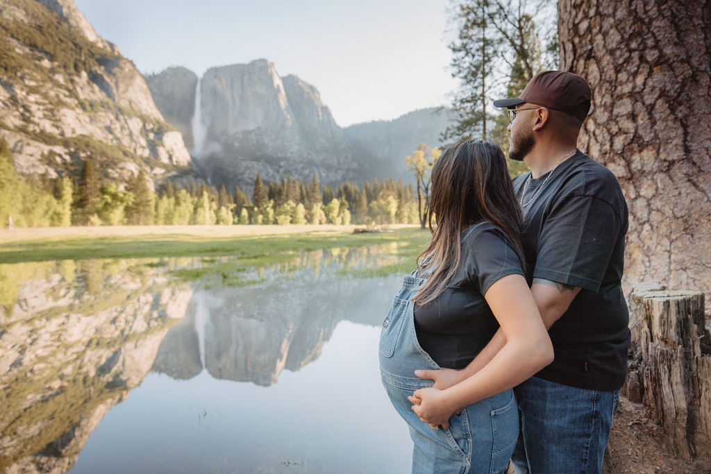 couple posing in Yosemite for their maternity photos
