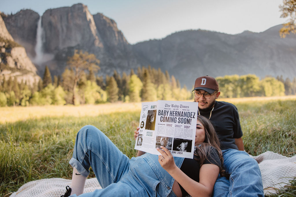 couple posing for a maternity session outdoors
