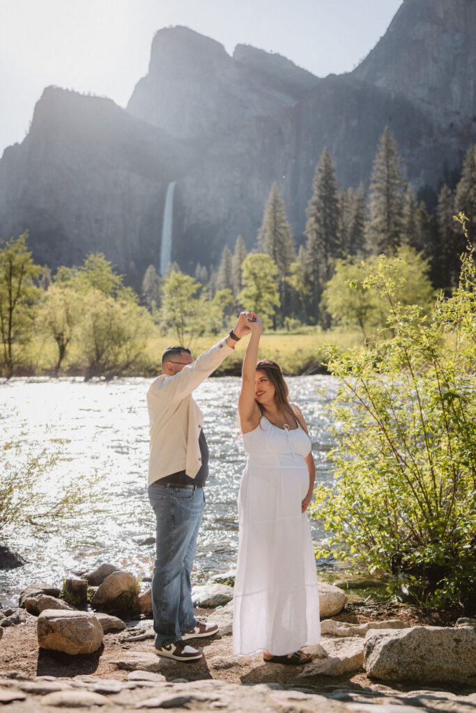 couple posing in Yosemite for their maternity photos
