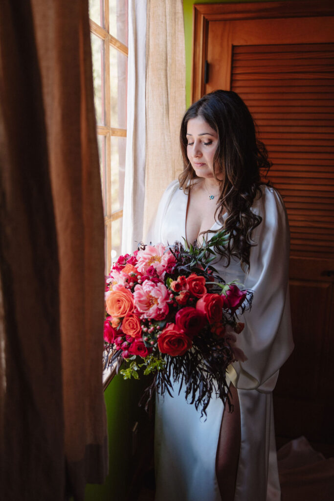 bride and groom posing for their outdoor wedding photos | wedding details during a redwood ranch wedding
