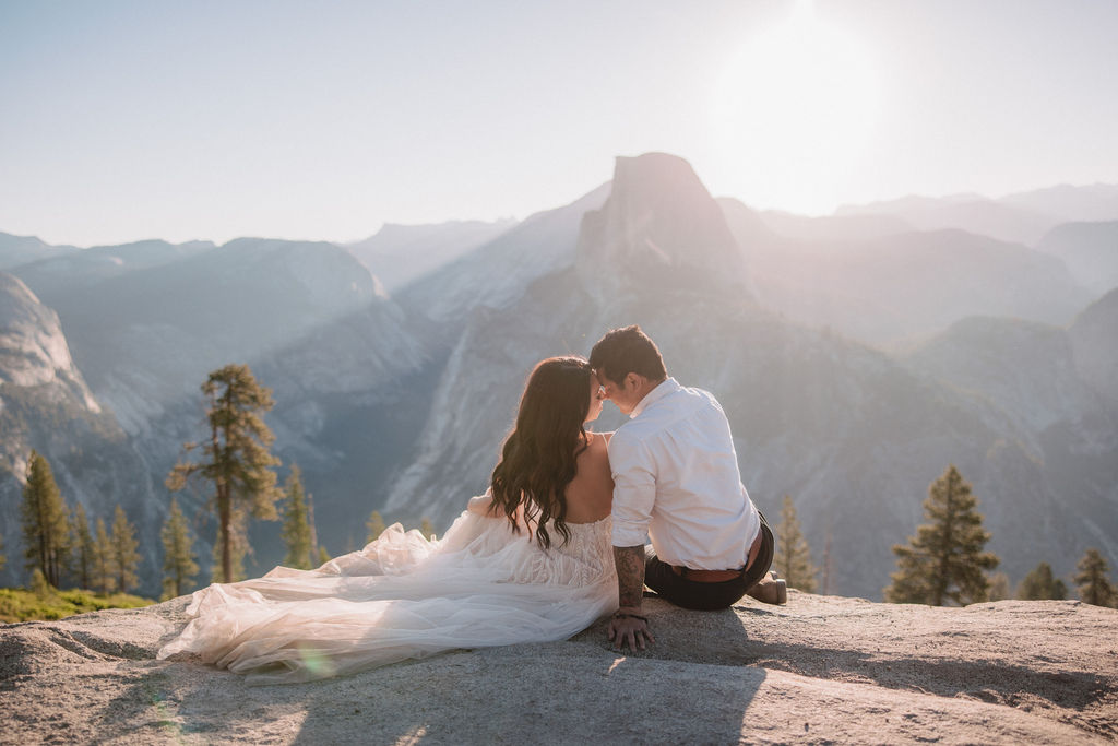 Couple at Yosemite national park at glacier point for their yosemite elopement photos at sunrise 