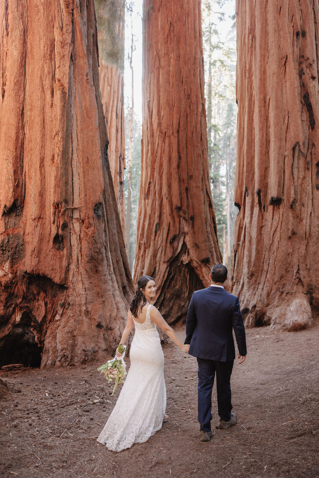 couple in sequoia national park near sequoias for their elopement Top 5 reasons to elope in sequoia national park