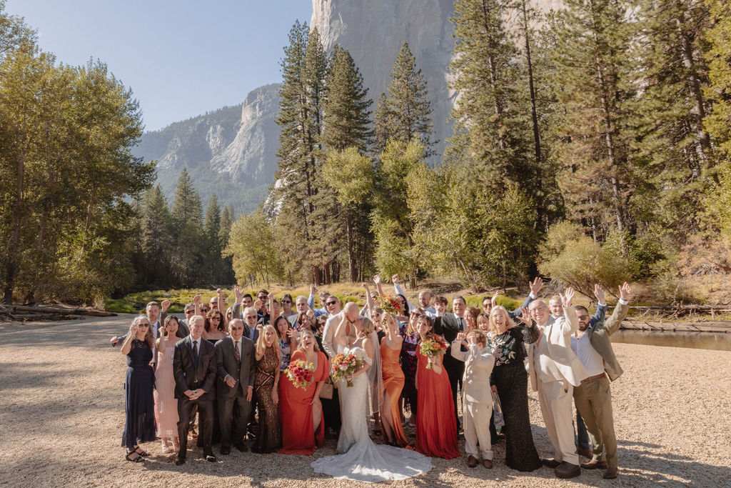 bride and groom take family portraits with family at a yosemite wedding