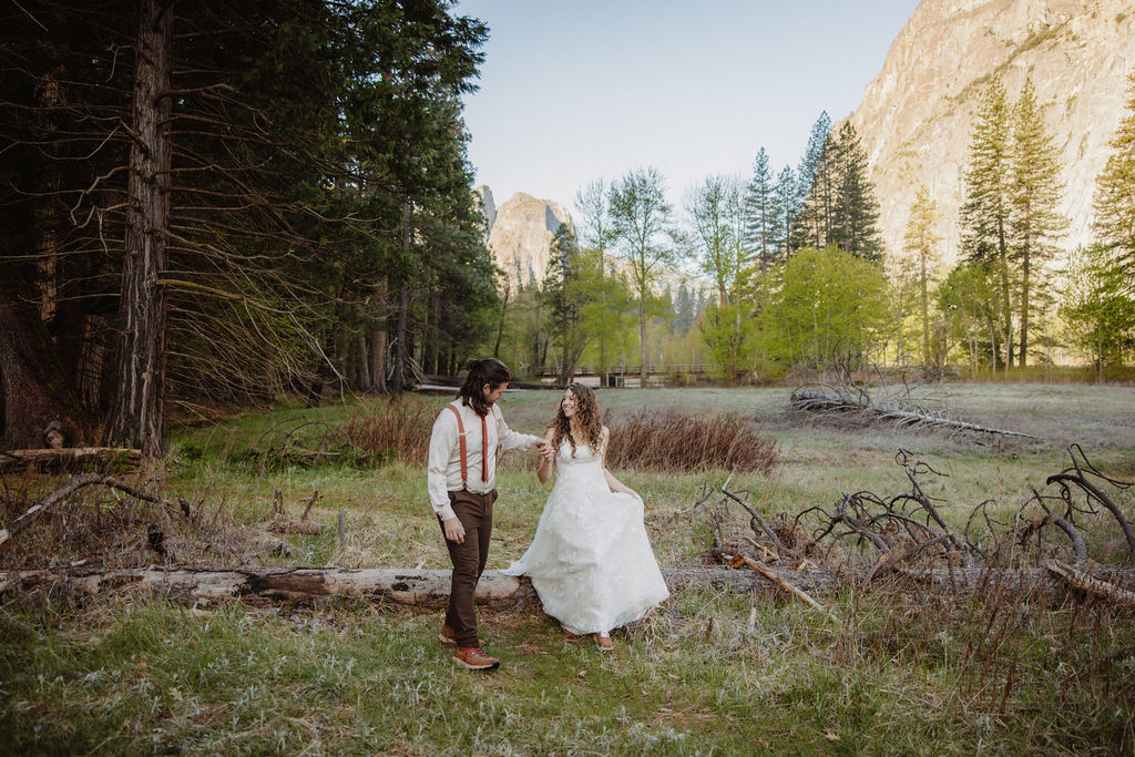 bride and groom take wedding portraits in yosemite national park