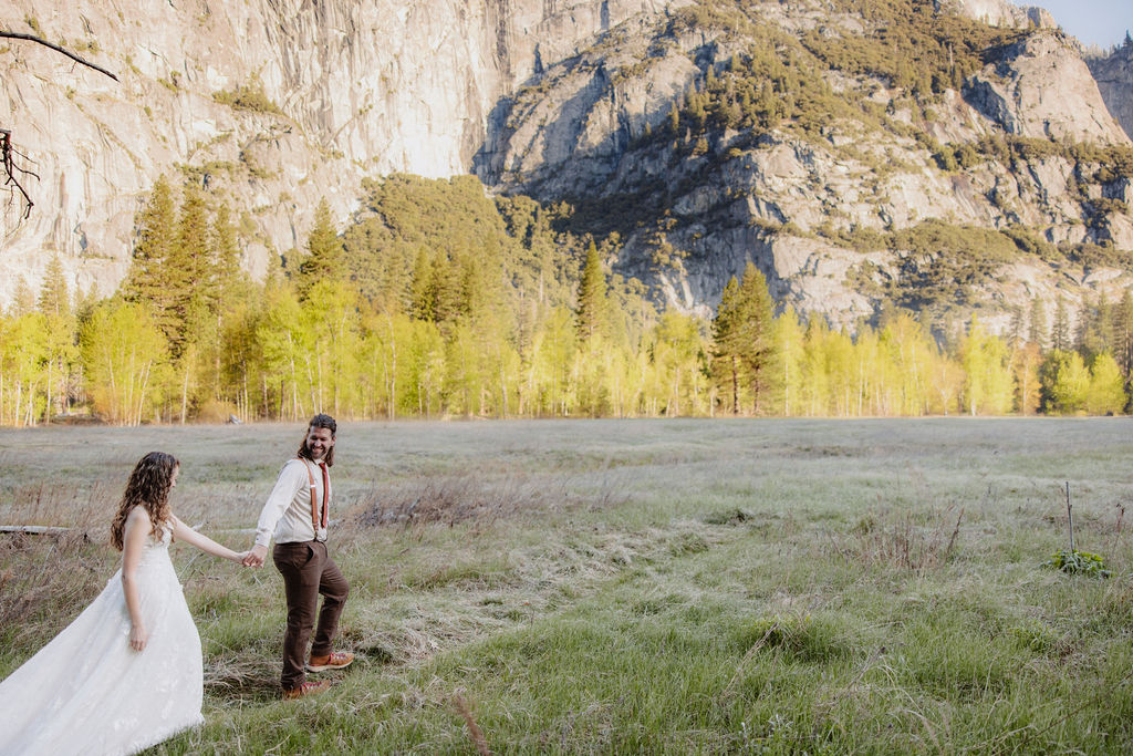 bride and groom take wedding portraits in yosemite national park