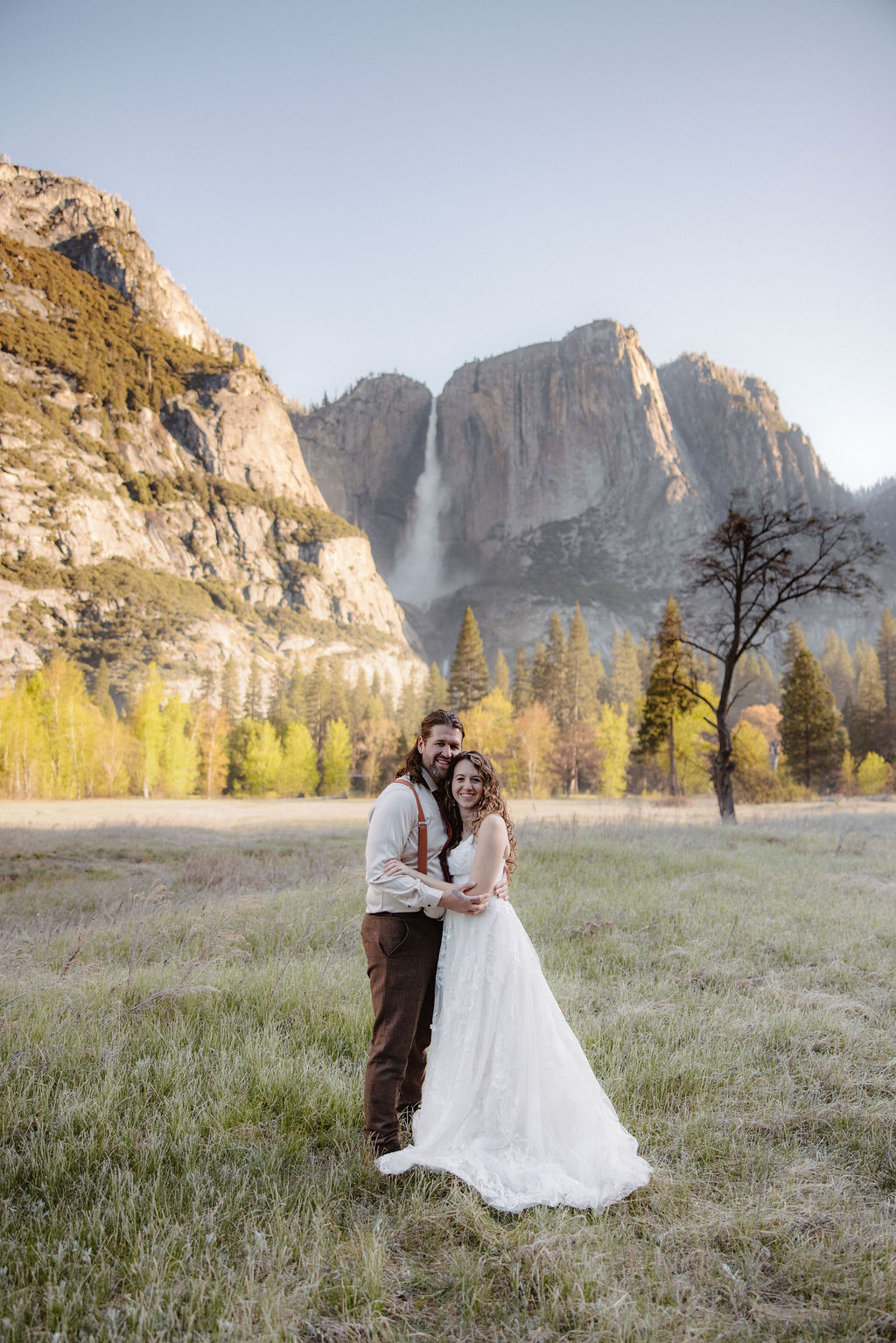 bride and groom take wedding portraits in yosemite national park