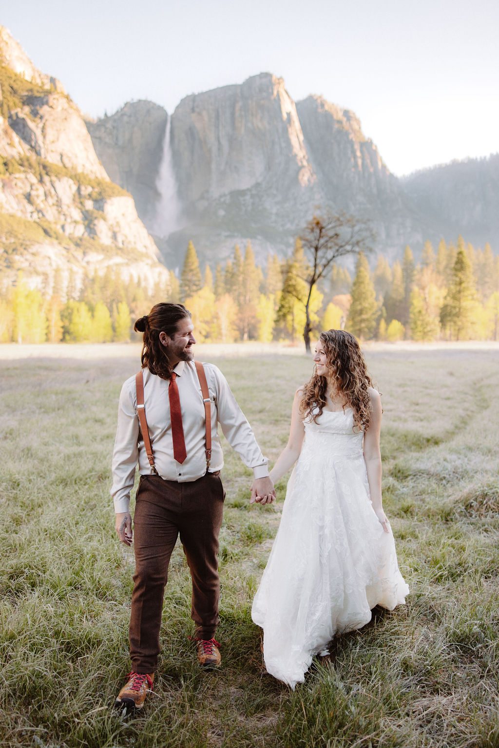 bride and groom take wedding portraits in yosemite national park