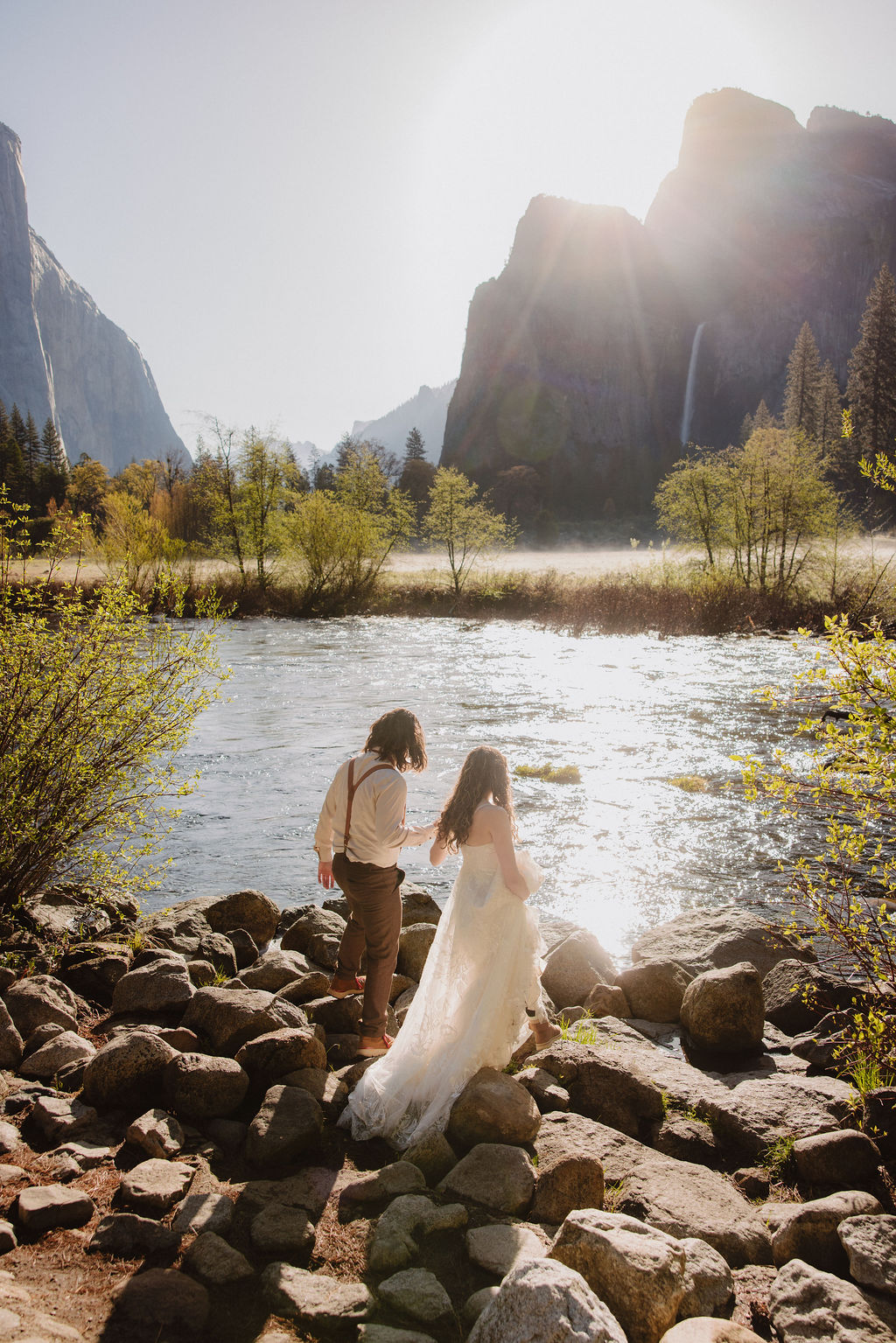 bride and groom take wedding portraits in yosemite national park