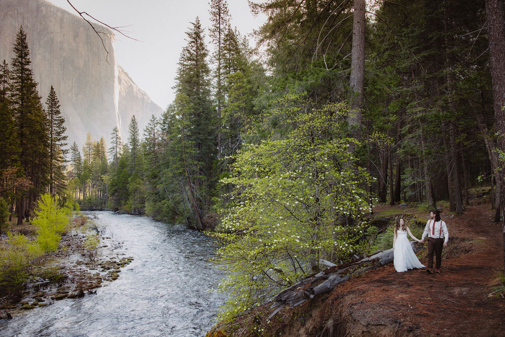 bride and groom take wedding portraits in yosemite national park