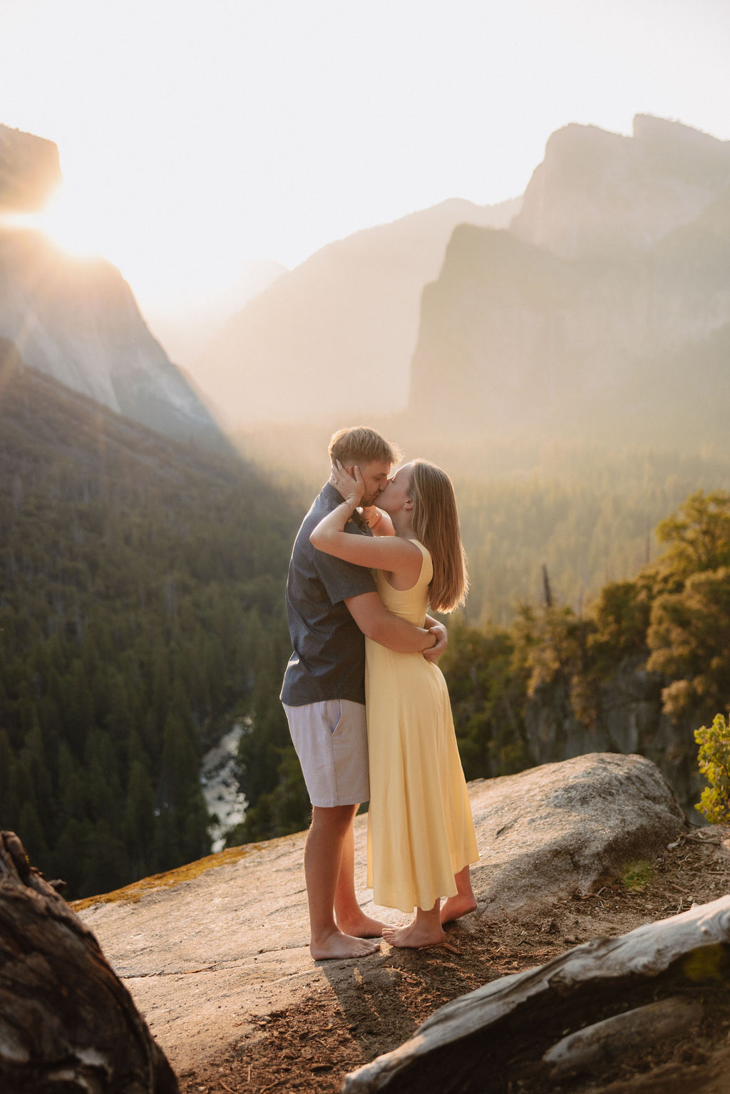 couple takes engagement photos at Tunnel View in Yosemite National Park