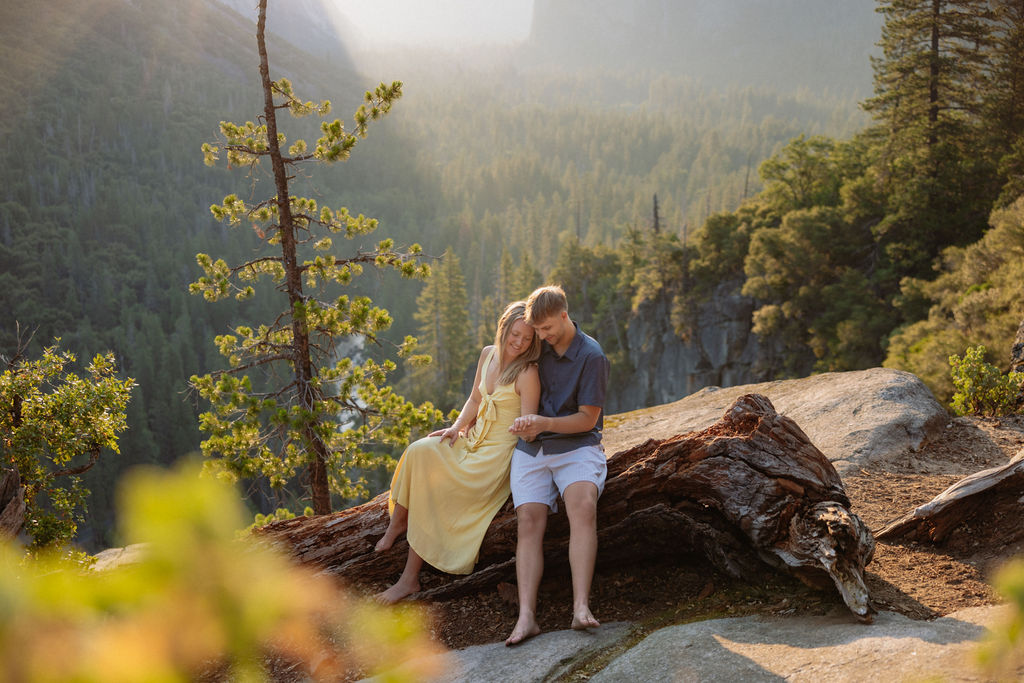 couple takes engagement photos at Tunnel View in Yosemite National Park