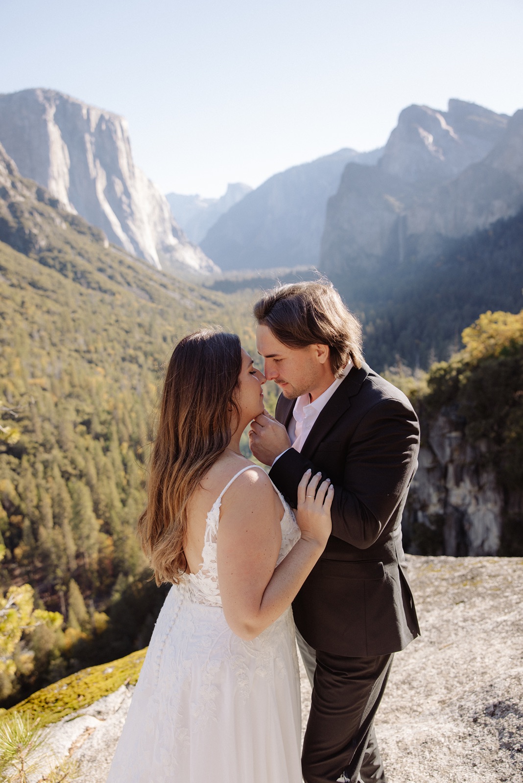 Bride and groom embrace at their intimate Yosemite elopement