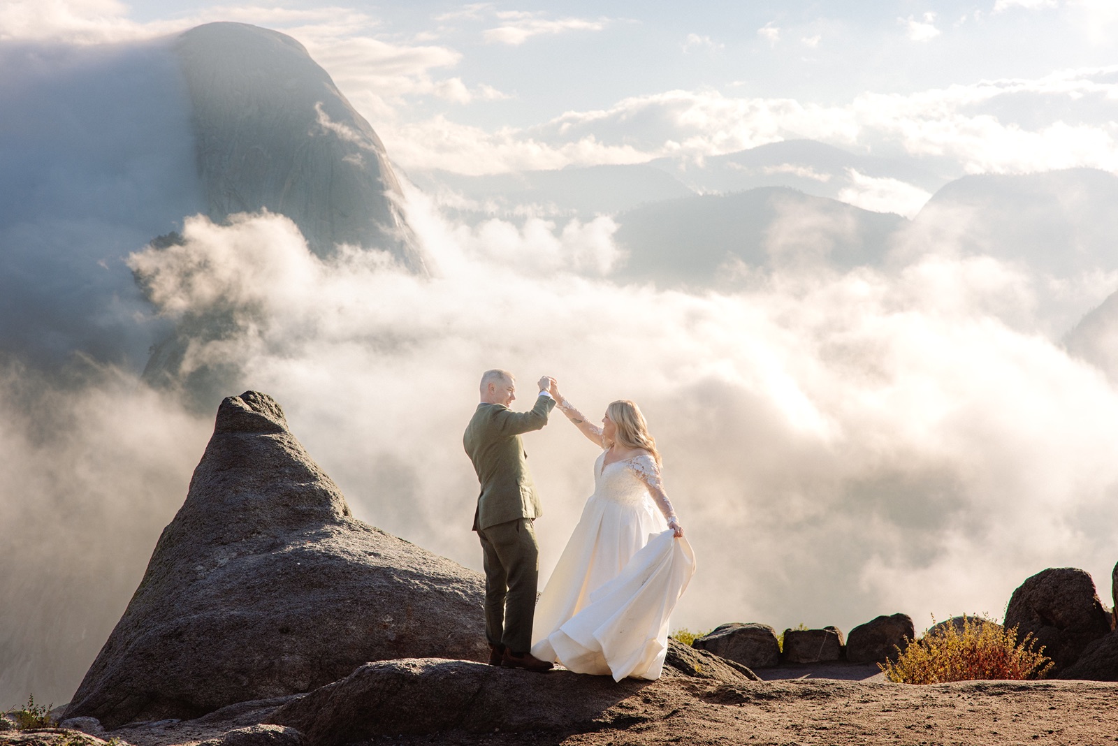 Bride and groom dance together during Yosemite elopement photos