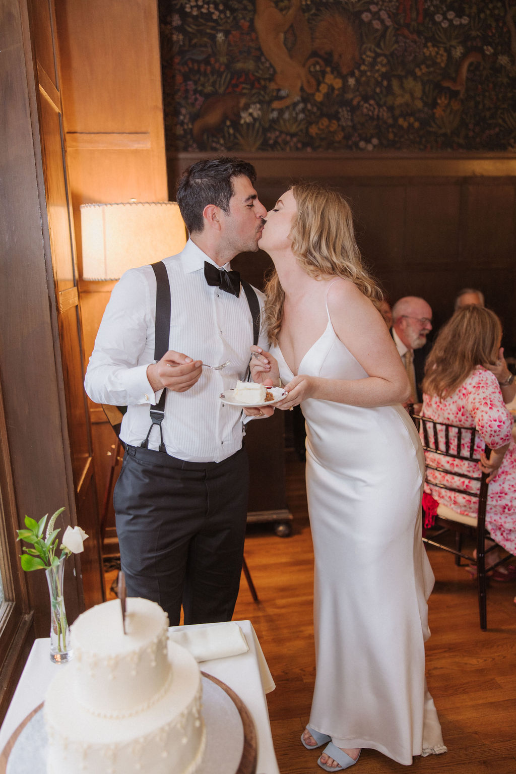 Bride and groom cut wedding cake at Ahwahnee Yosemite wedding