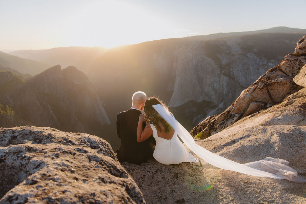 Bride and groom at Taft Point during their summer Yosemite elopement