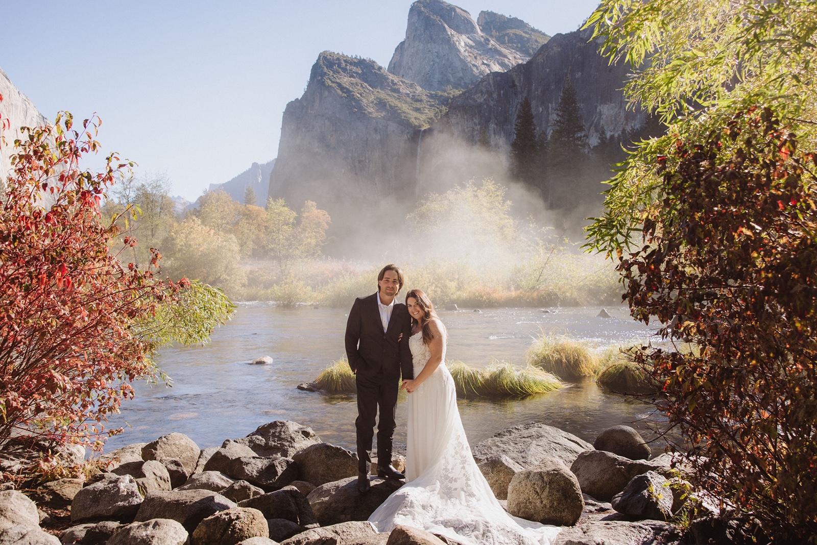 Bride and groom smile during their Valley View elopement portraits