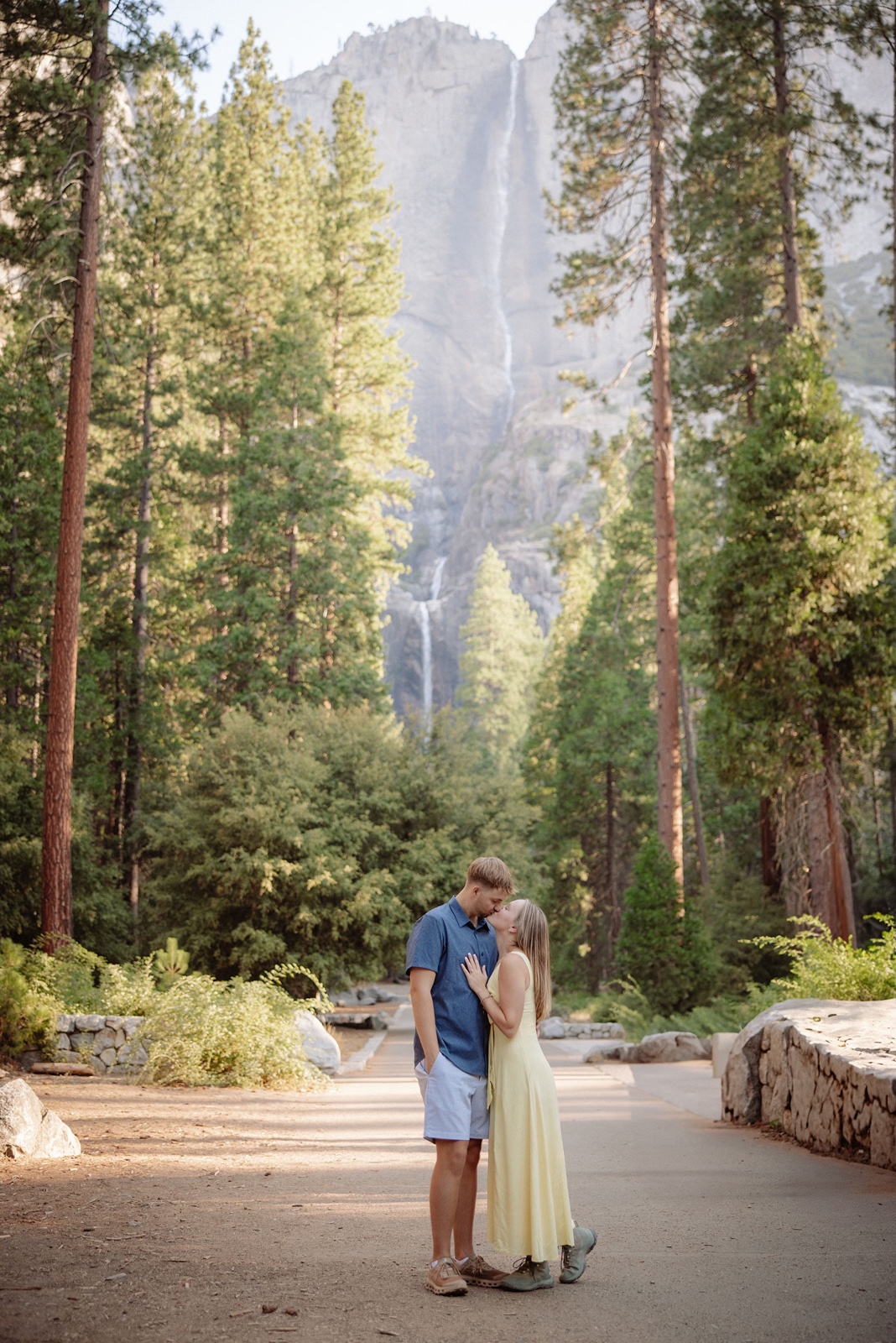 Man and woman during their Yosemite Falls engagement photos